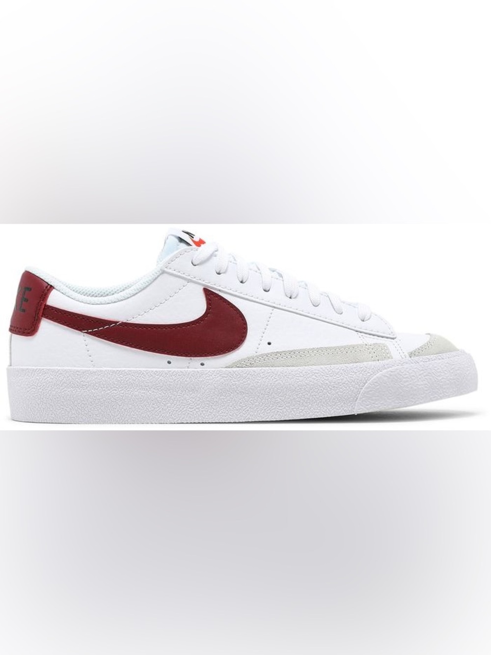the Nike Blazer Low '77 GS (Grade School) in the "White Team Red"